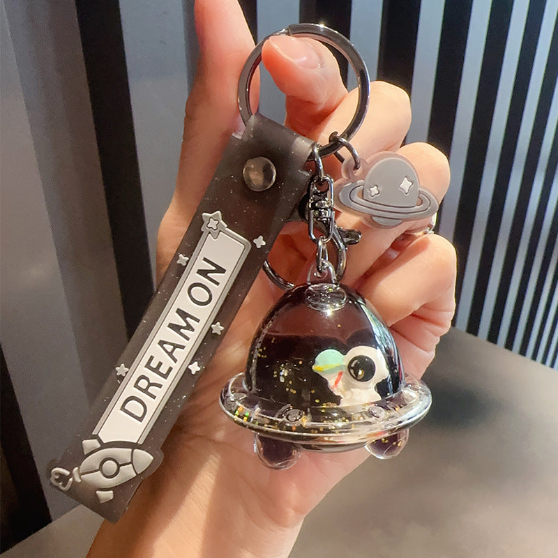 Wholesale Cartoon Black Gold Astronaut Astronaut Doll Into Oil Quicksand Drift Bottle Acrylic Keychain